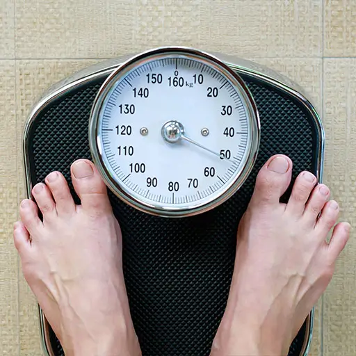 Scale showing weight loss progress